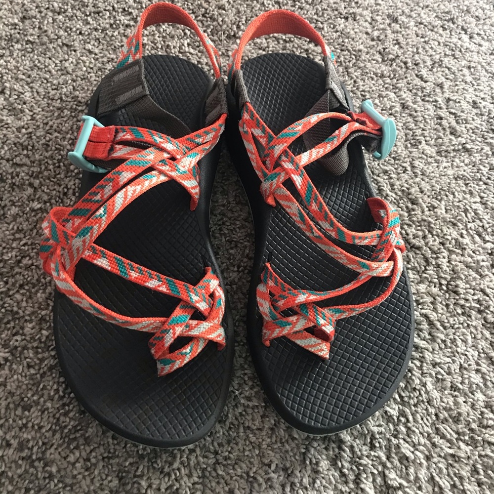 orange and blue chacos w/ toe strap